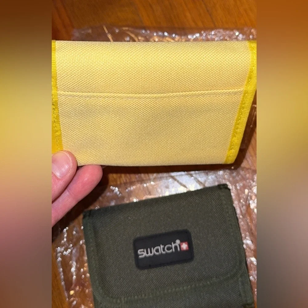 NWT Swatch brand wallet/billfold coin purse available in green or yellow unisex